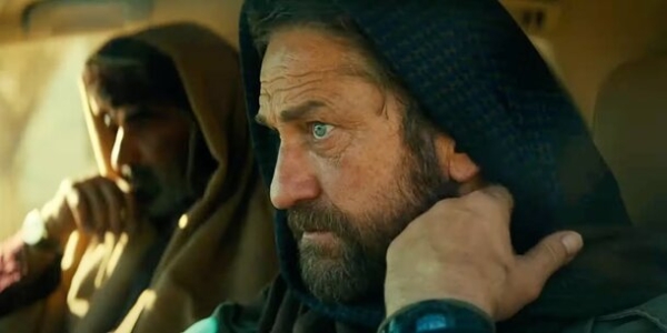 Джерард Батлер участвует в гонке на выживание в дублированном трейлере боевика «Беглец» 